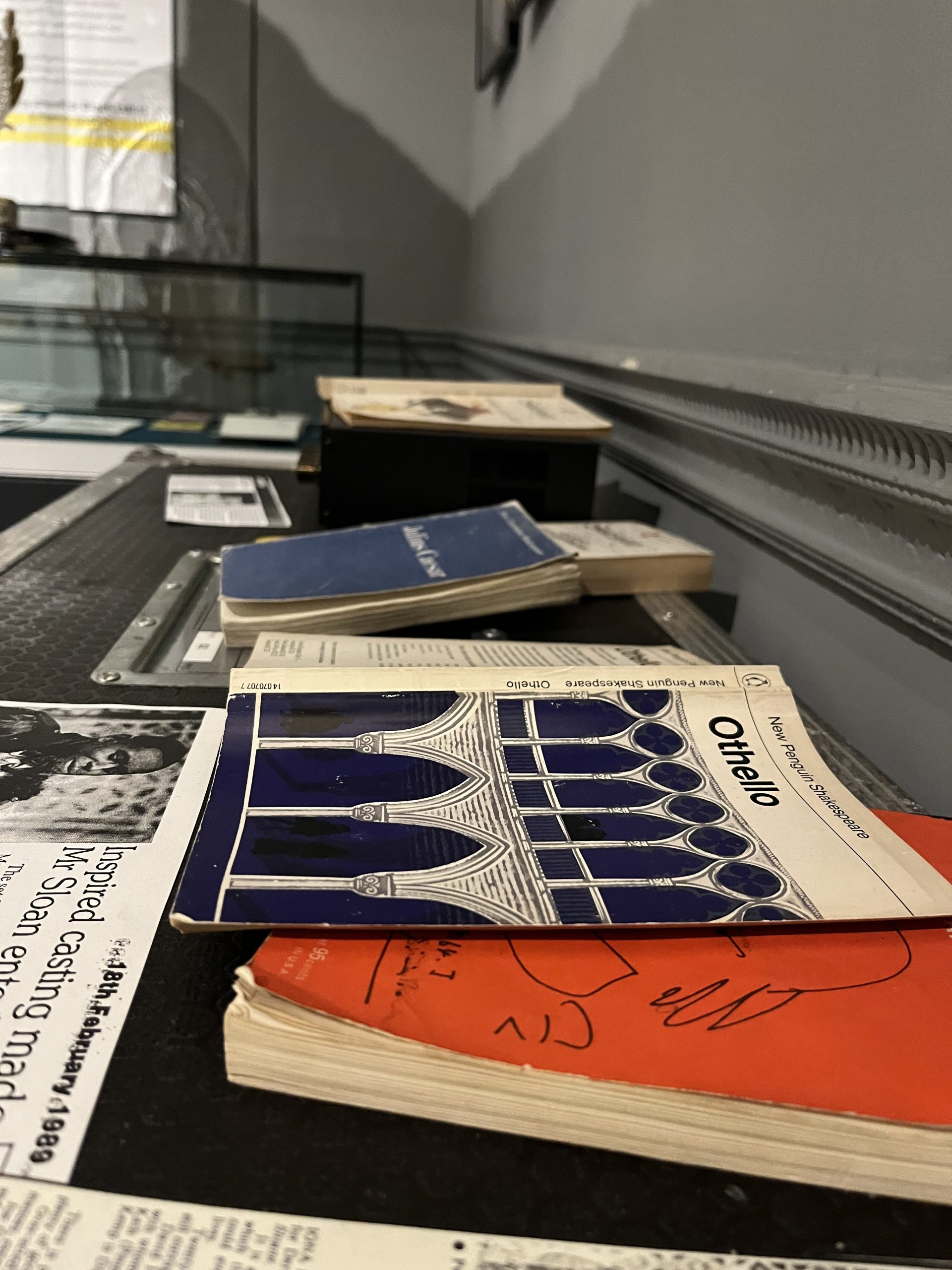 New Penguin Shakespeare book of Othello lays open on top of old script books used by David Harewood throughout his career