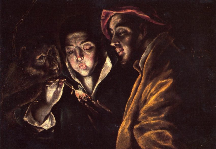 A darkly lit oil picture showing three half-length figures huddled together. The central figure blows on a hot coal, which illuminates the scene. To the left and right stands a chained monkey and a grinning fool.