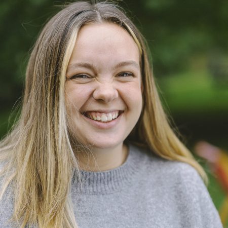 Young lady smiling with crinkly nose