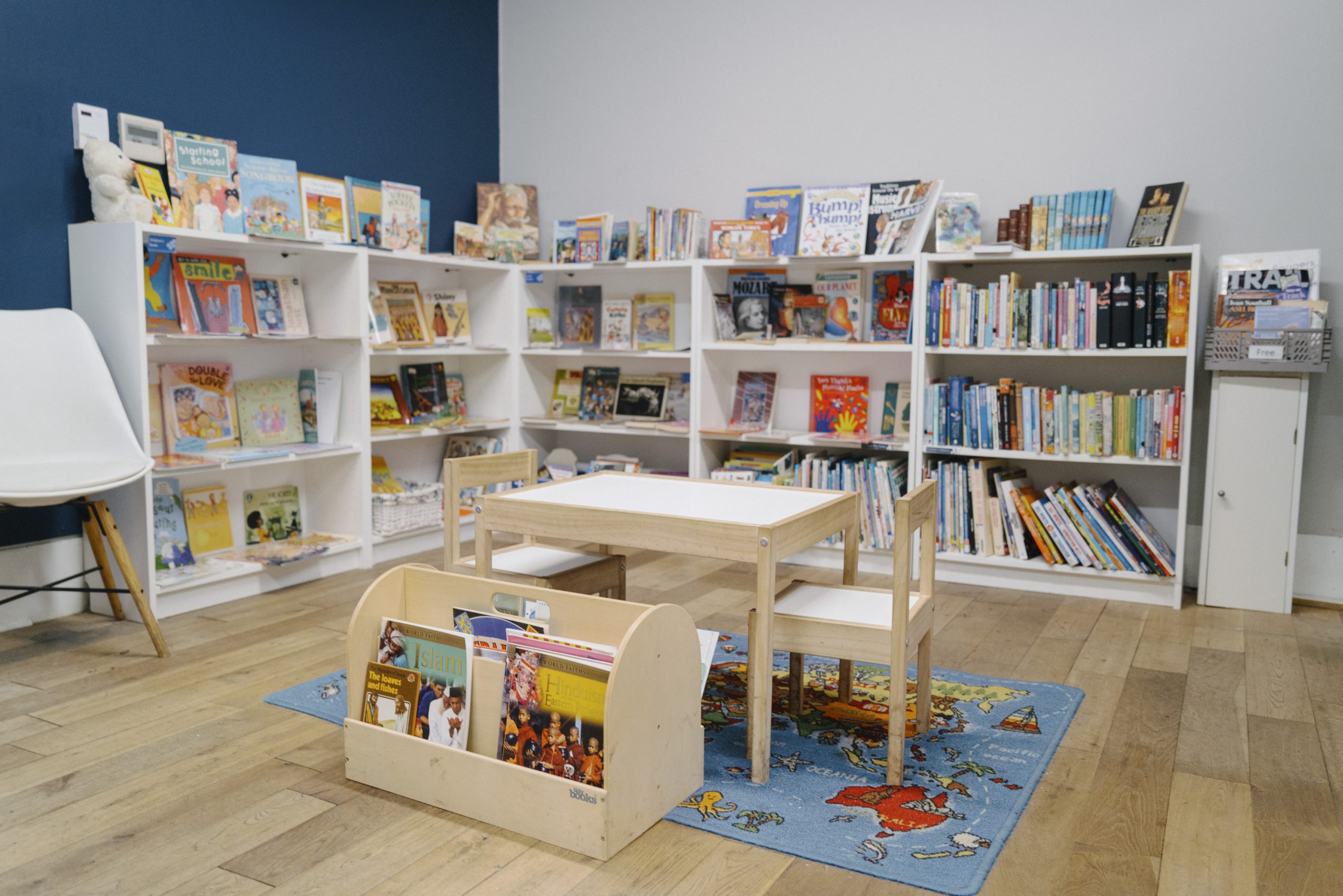 Tucked in the corner of the Secondhand Bookshop is the Children's corner. With low level shelving units filled with books for young readers, a small table and chairs stand in the middle, welcoming them to explore the pages of their chosen book.